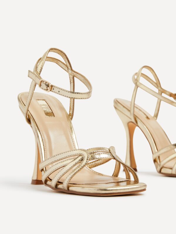 Step Up Your Style Game with Chic Heeled Sandals - Image 4